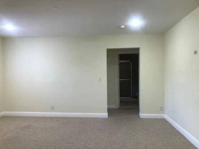 an empty room with an entryway