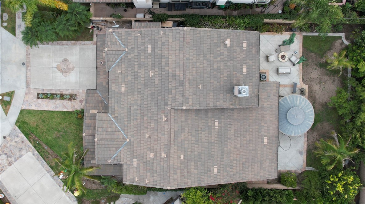 2850 North Stone Pine Glen Santa Ana, CA 92706 - Photo 2 of 45 an aerial view of a house with a yard and pool