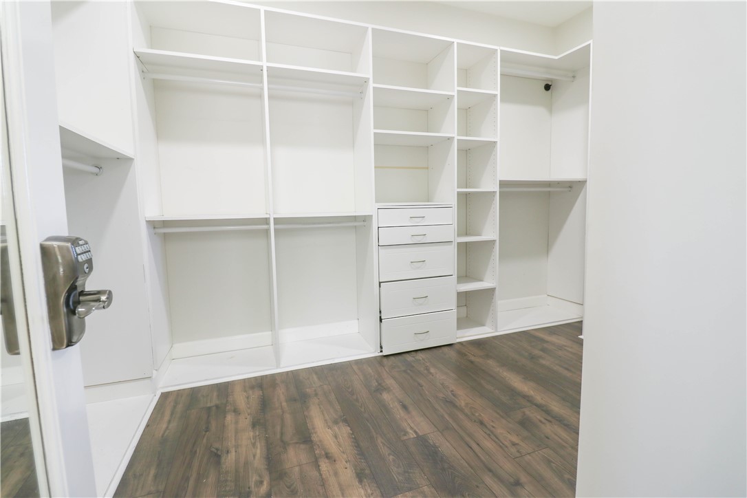 2850 North Stone Pine Glen Santa Ana, CA 92706 - Photo 27 of 45 a view of walk in closet with empty racks