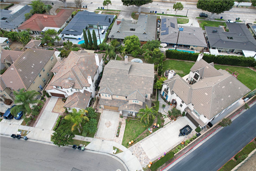 2850 North Stone Pine Glen Santa Ana, CA 92706 - Photo 4 of 45 an aerial view of multiple houses with yard