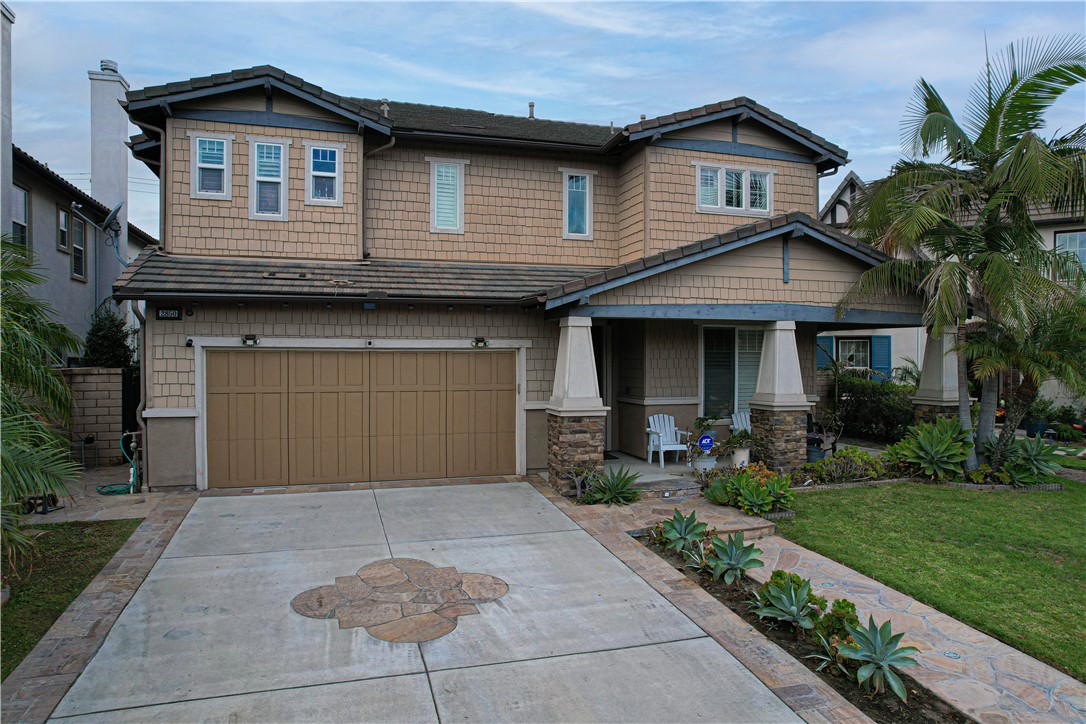 2850 North Stone Pine Glen Santa Ana, CA 92706 - Photo 8 of 45 a front view of a house with garden