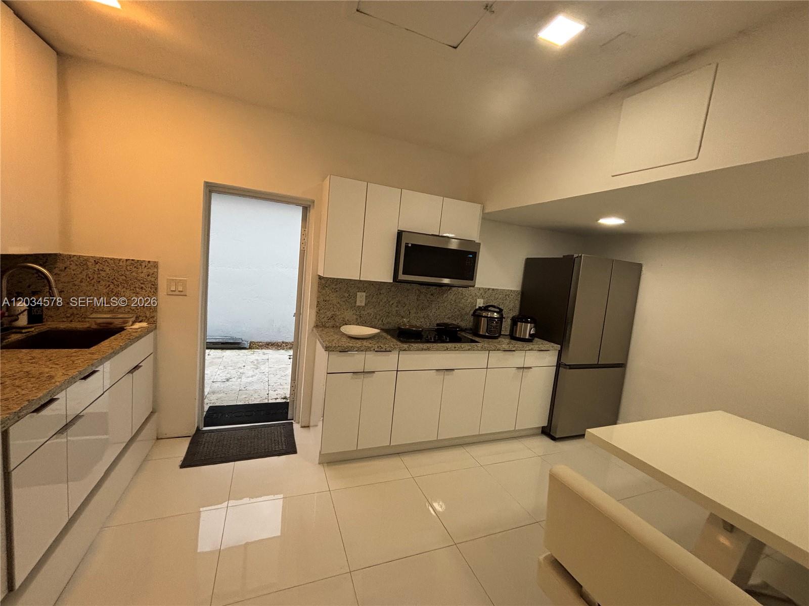 8143 Southwest 162nd Path Miami, FL 33193 - Photo 17 of 20 2nd kitchen