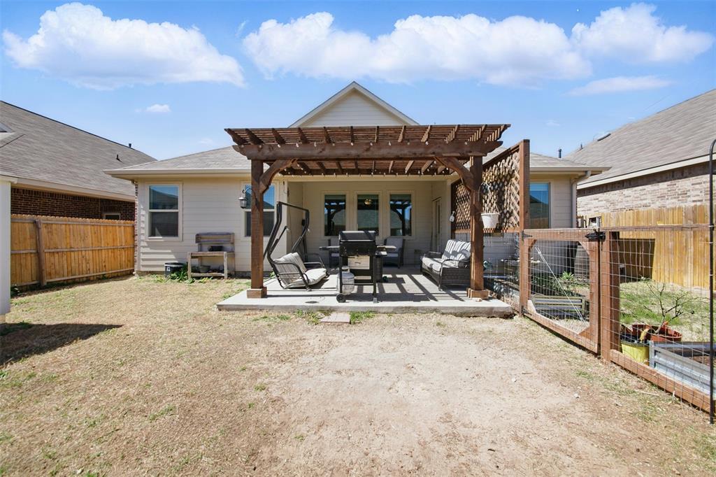 14808 Hester Trail Fort Worth, TX 76052 - Photo 27 of 31 a view of a house with patio