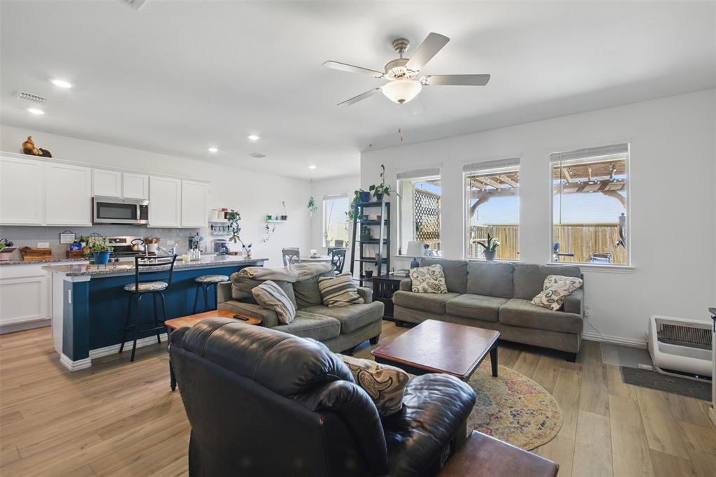 14808 Hester Trail Fort Worth, TX 76052 - Photo 8 of 31 a living room with furniture kitchen and a wooden floor