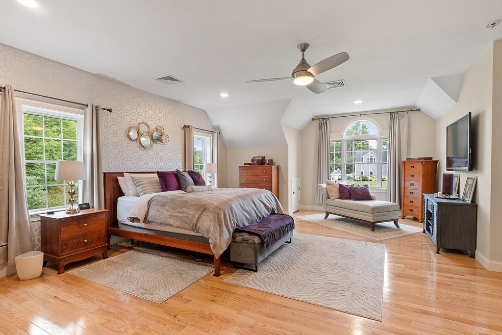 5 Azalea Lane Upton, MA 01568 - Photo 18 of 42 a spacious bedroom with a bed couch and window