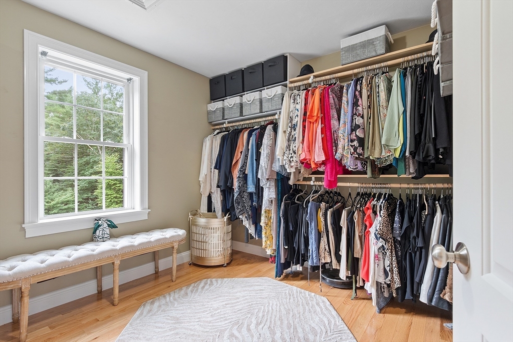 5 Azalea Lane Upton, MA 01568 - Photo 20 of 42 a view of walk in closet with clothes and shoes