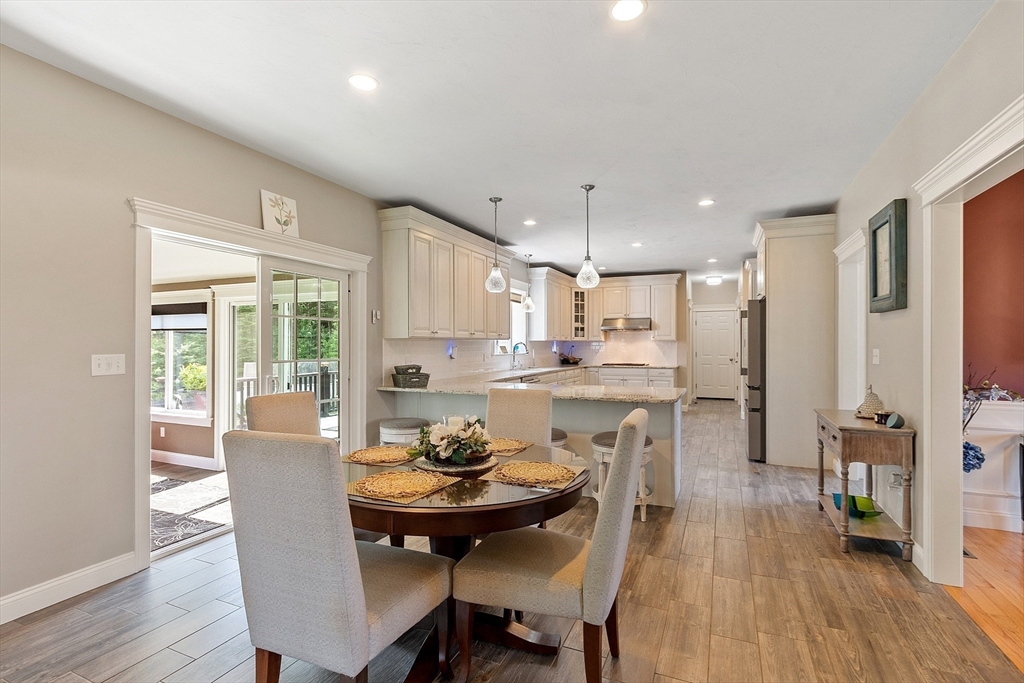 5 Azalea Lane Upton, MA 01568 - Photo 3 of 42 a view of a dining room with furniture and wooden floor