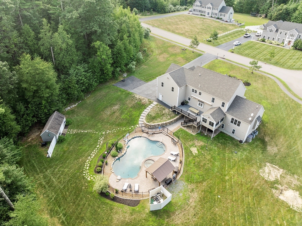 5 Azalea Lane Upton, MA 01568 - Photo 40 of 42 an aerial view of a house with a swimming pool