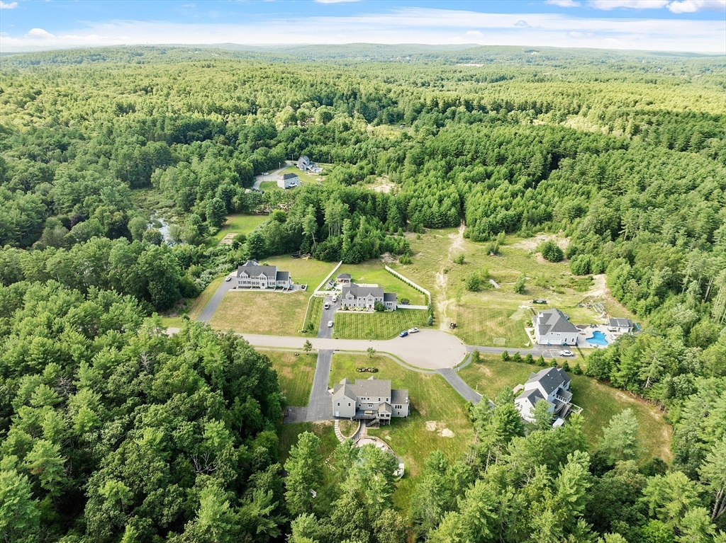5 Azalea Lane Upton, MA 01568 - Photo 42 of 42 a view of a lake with a yard