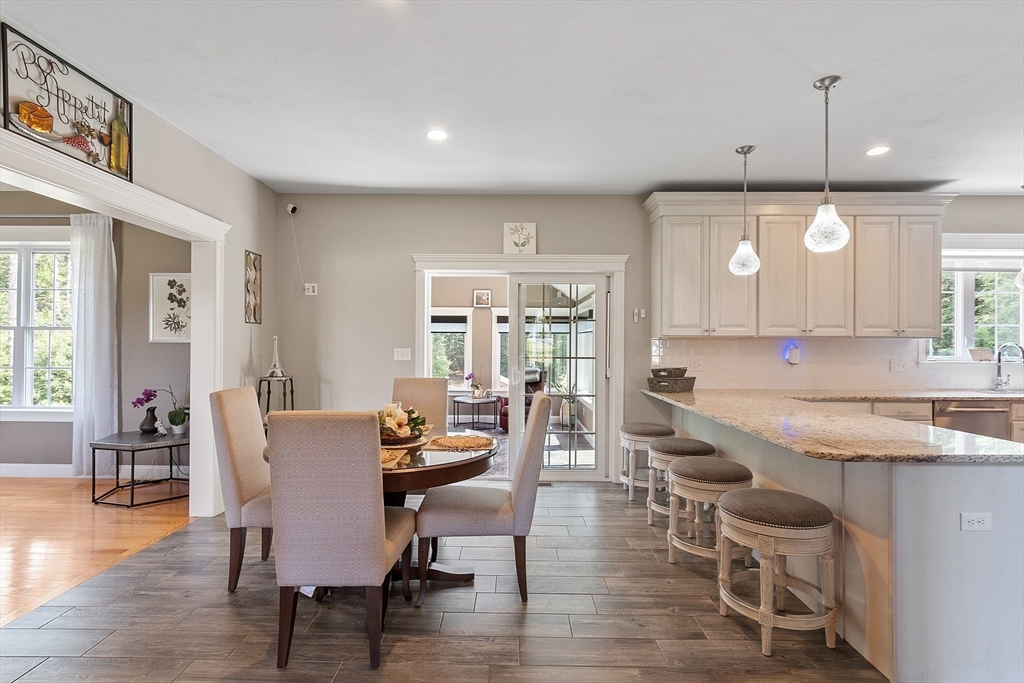 5 Azalea Lane Upton, MA 01568 - Photo 5 of 42 a view of a dining room with furniture and wooden floor