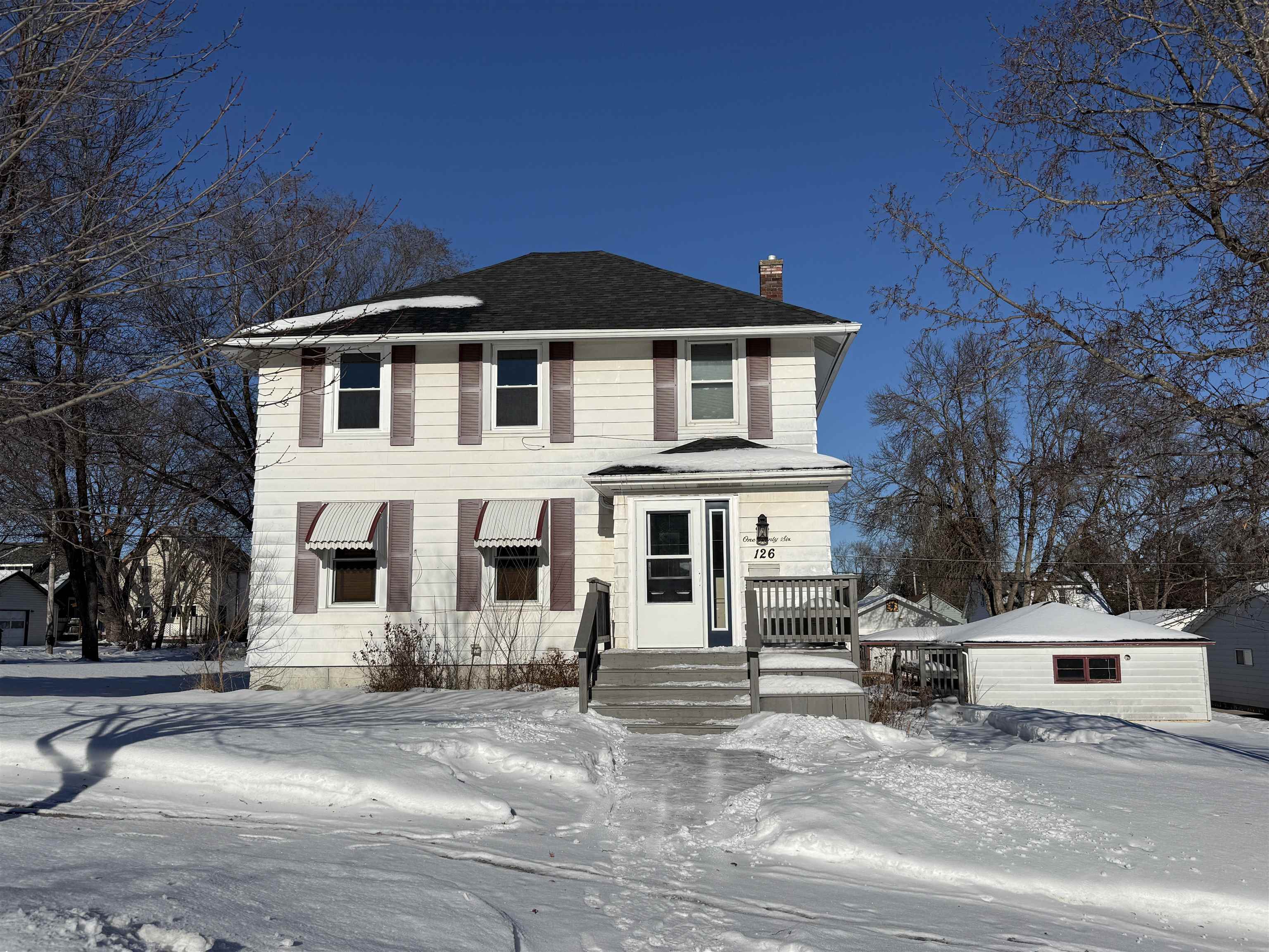 126 5th Street Northwest Chisholm, MN 55719 - Photo 1 of 35 View of front facade featuring a chimney