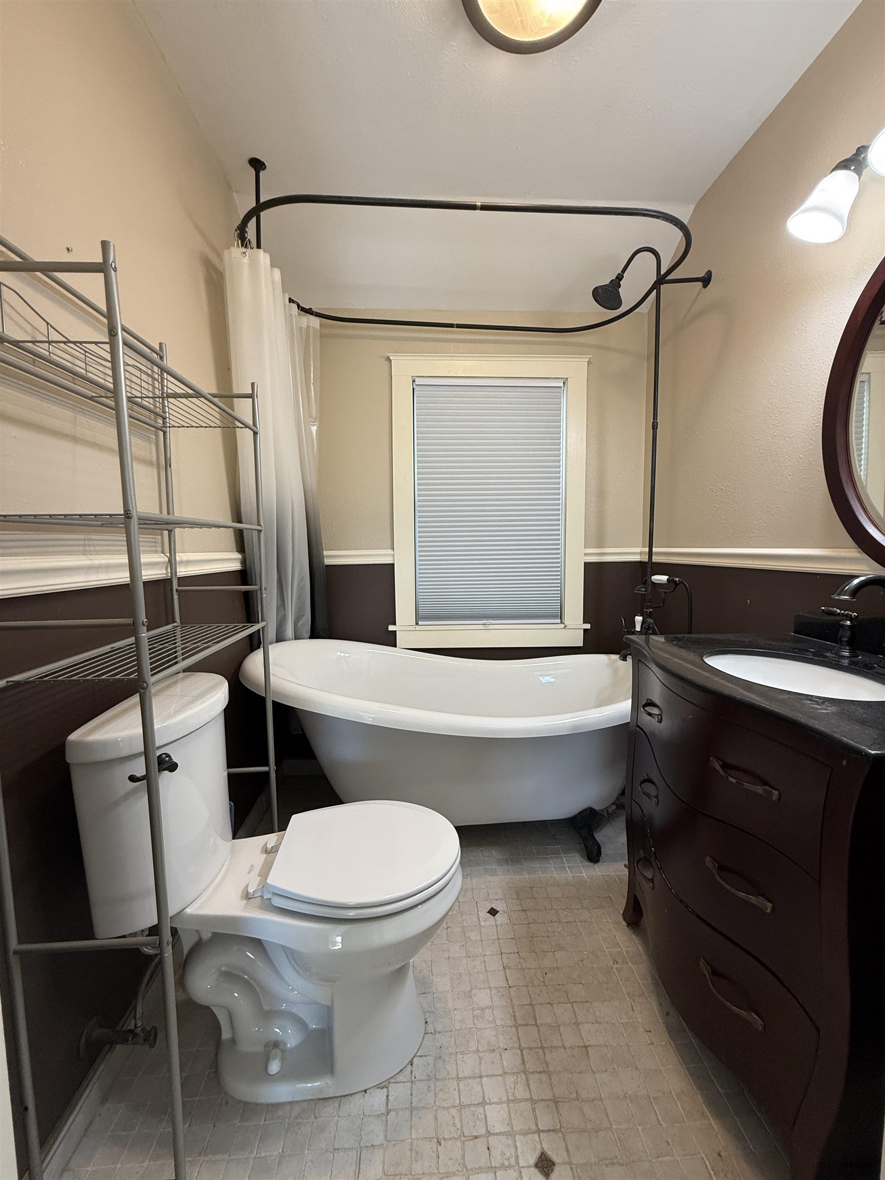 126 5th Street Northwest Chisholm, MN 55719 - Photo 28 of 35 Bathroom with vanity and a wainscoted wall