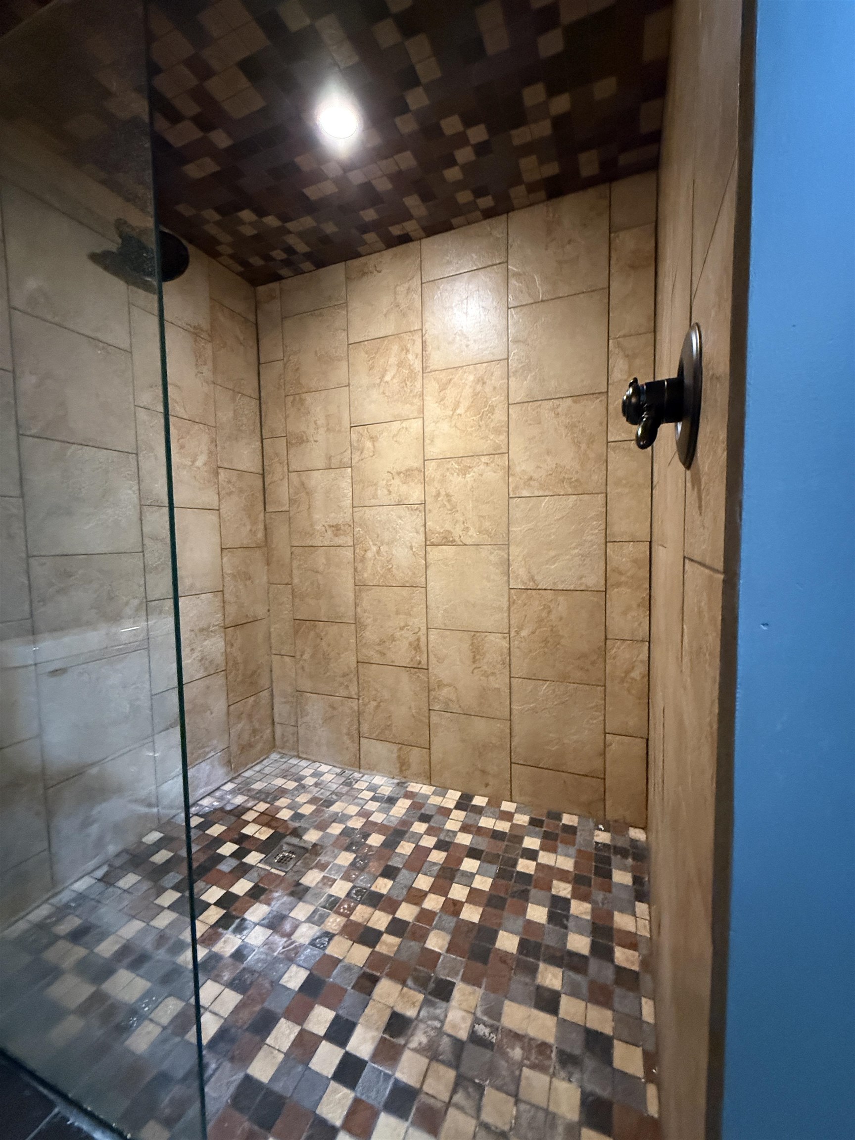 126 5th Street Northwest Chisholm, MN 55719 - Photo 34 of 35 Bathroom featuring a tile shower