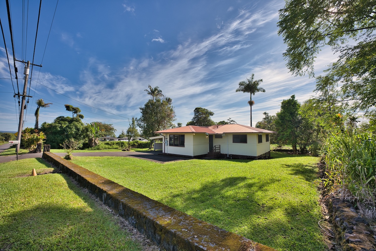 235 Malaai Road Hilo, HI 96720 - Photo 2 of 14 a view of a house with a yard and sitting area