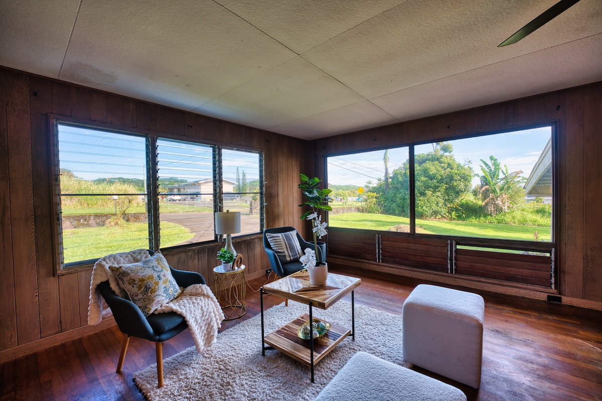 235 Malaai Road Hilo, HI 96720 - Photo 3 of 14 a living room with furniture and a large window