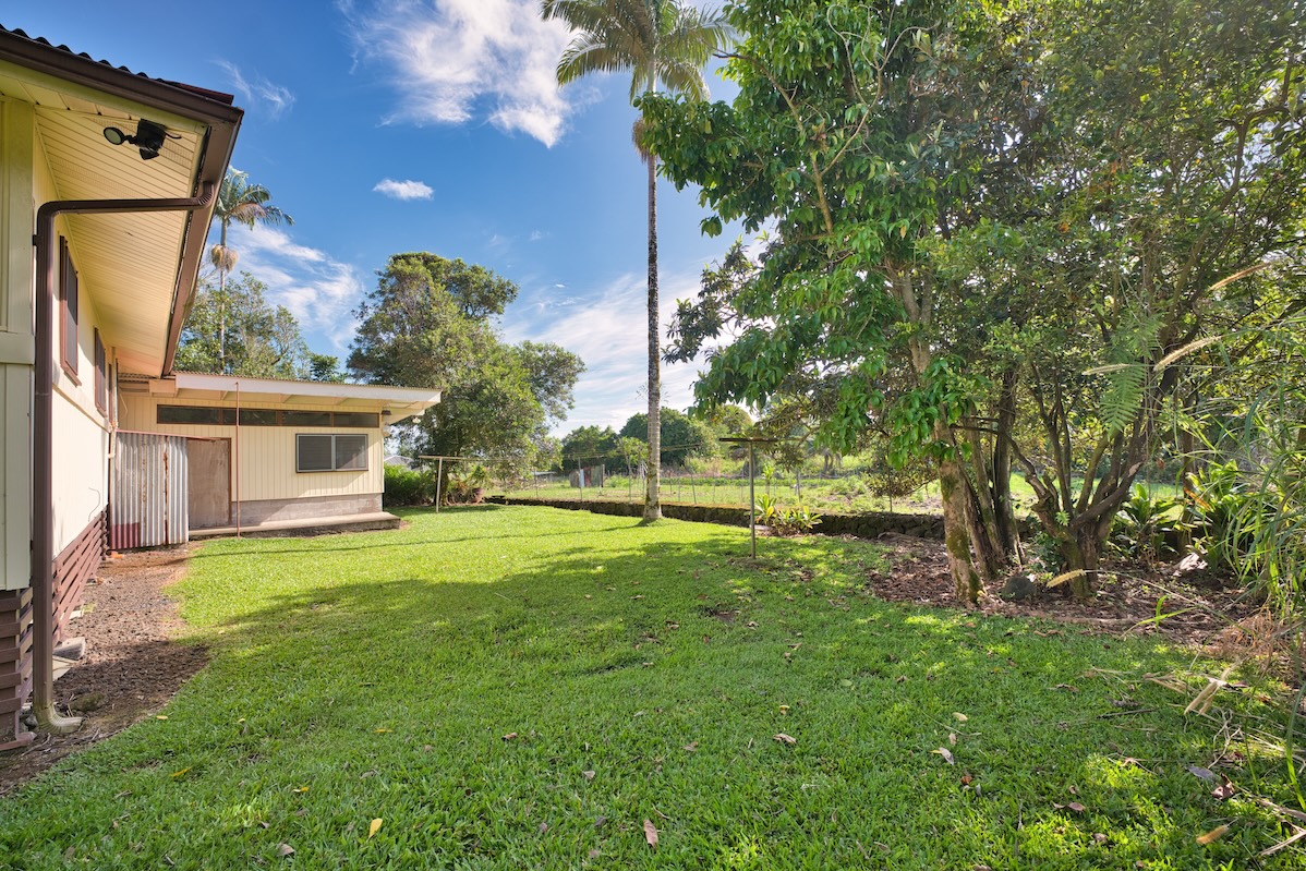235 Malaai Road Hilo, HI 96720 - Photo 9 of 14 a view of a house with a backyard
