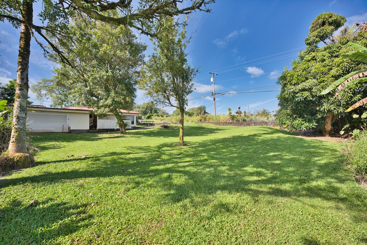 235 Malaai Road Hilo, HI 96720 - Photo 10 of 14 a view of a house with a yard