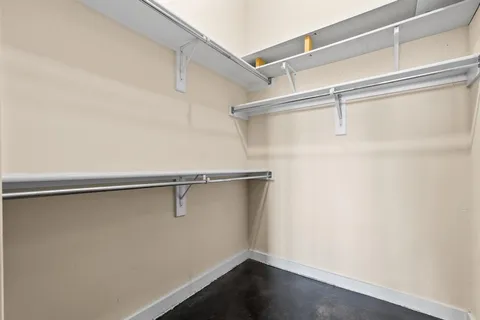 a view of a room with racks on the wall