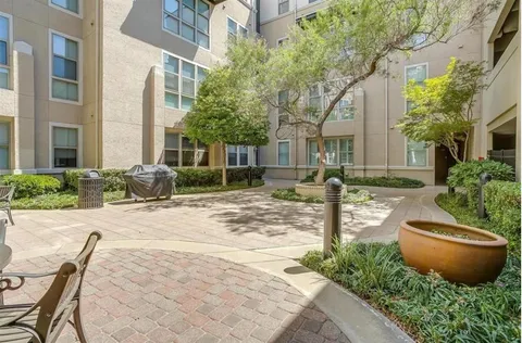 a view of city with tall buildings