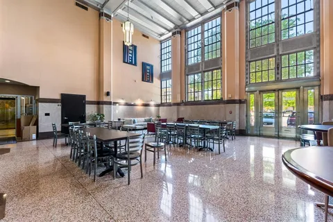 a view of dinning table and chairs in patio