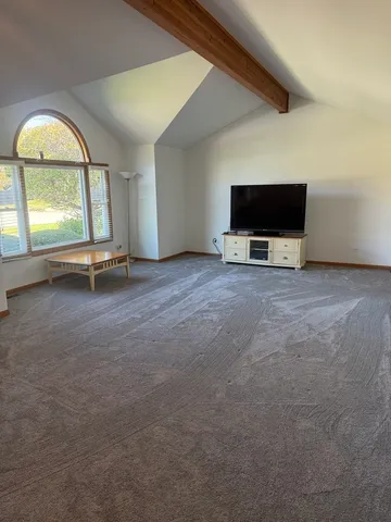 a view of a livingroom with a flat screen tv