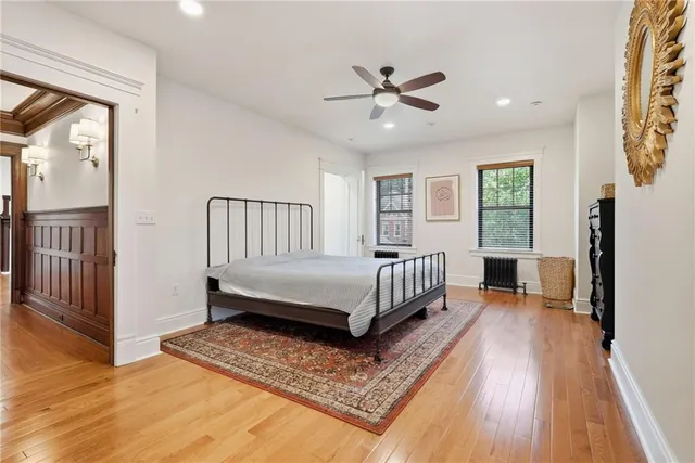 a room with a bed and a window