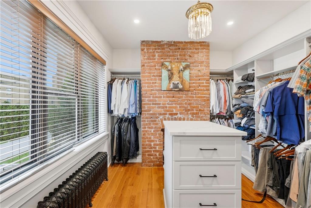 4749 Wallingford Street Pittsburgh, PA 15213 - Photo 34 of 49 a view of walk in closet with clothes and shoes