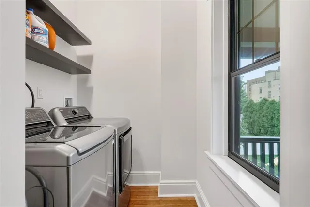 a utility room with dryer and washer