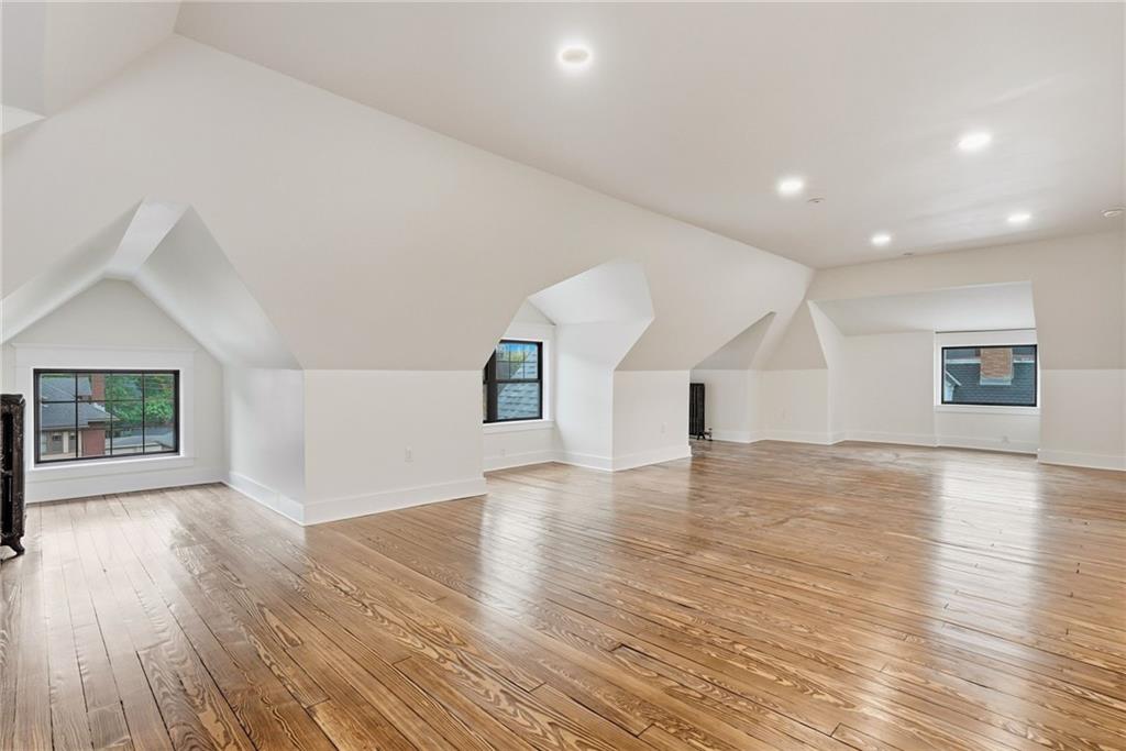 4749 Wallingford Street Pittsburgh, PA 15213 - Photo 40 of 49 a view of empty room with wooden floor and window