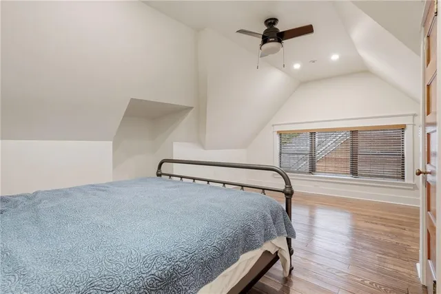 a view of a ceiling fan and wooden floor