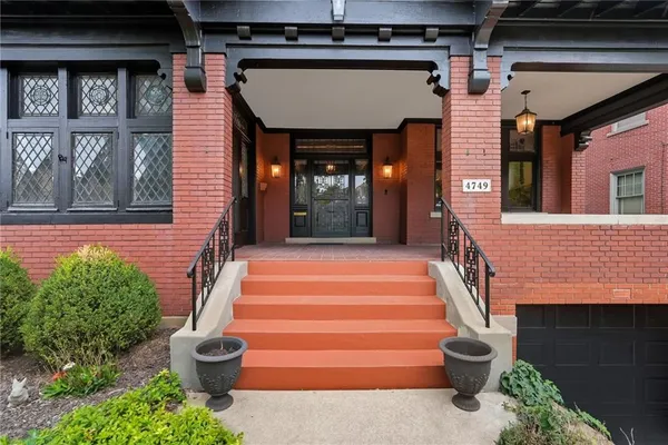 a front view of a house with a porch