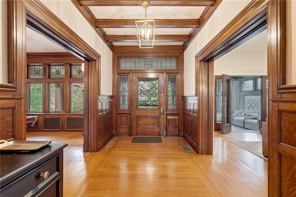 4749 Wallingford Street Pittsburgh, PA 15213 - Photo 5 of 49 a lobby with furniture and floor to ceiling window