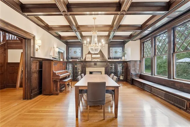 a dining room with stainless steel appliances granite countertop lots of counter top space