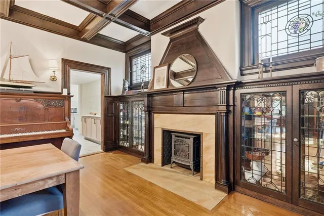 a view of a livingroom with furniture and a fireplace