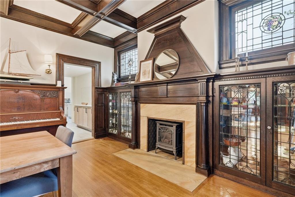 4749 Wallingford Street Pittsburgh, PA 15213 - Photo 10 of 49 a view of a livingroom with furniture and a fireplace