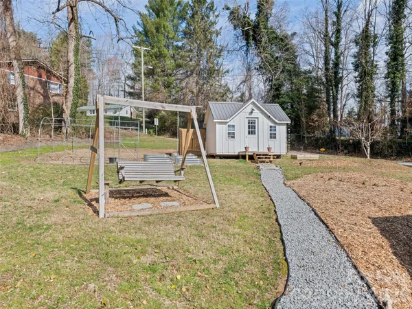 a bedroom with a bed and a walk in closet