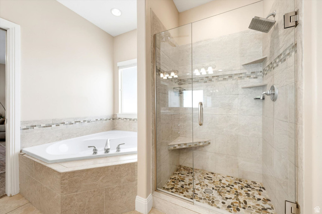 621 East 940 South St. George, UT 84790 - Photo 26 of 55 Walk-in shower with clear glass enclosure and pebble-style flooring