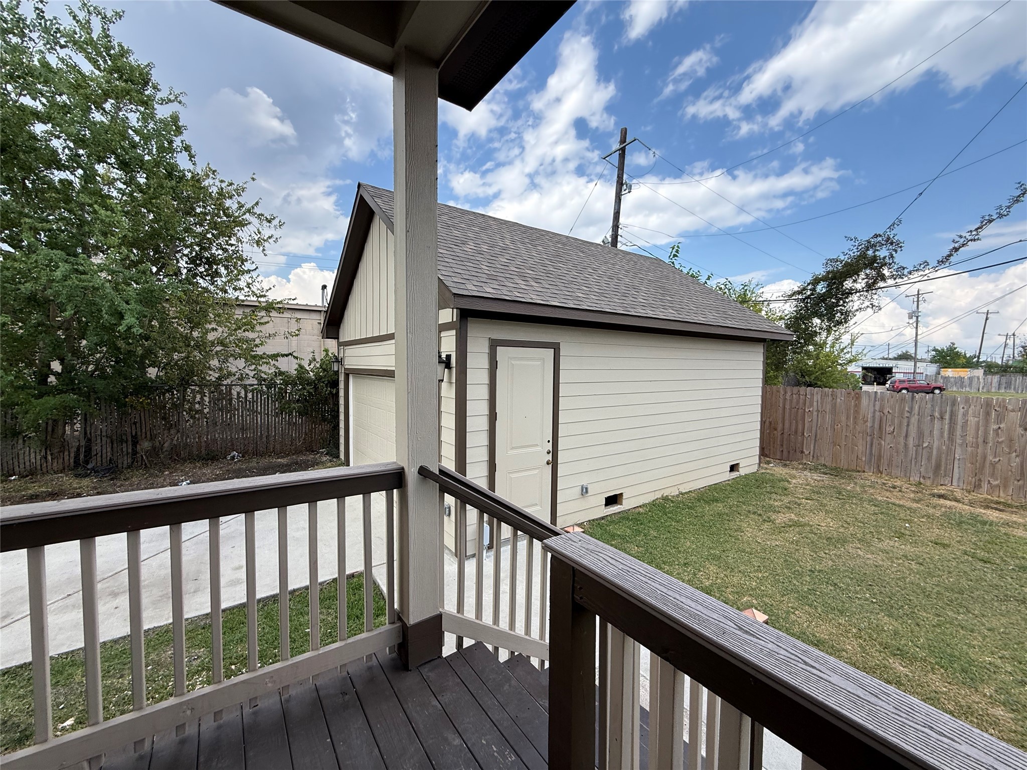 217 Kalmer Street Pasadena, TX 77502 - Photo 4 of 30 a view of a wooden fence