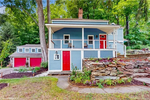 a front view of house with yard