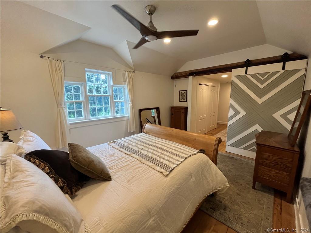 15 Riverview Road New Milford, CT 06755 - Photo 20 of 40 a bedroom with a bed and a window