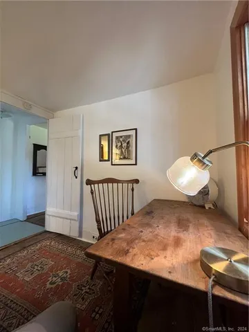 a bedroom with a bed and cabinets