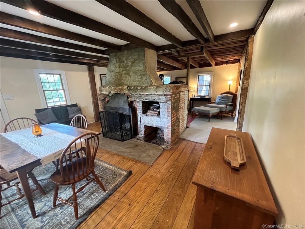 15 Riverview Road New Milford, CT 06755 - Photo 7 of 40 a living room with furniture and a fireplace