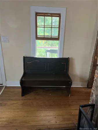 a view of sitting area with furniture and a window