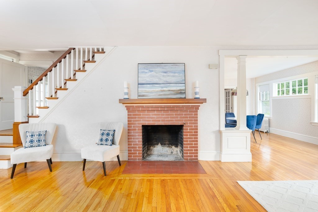 34 Brook Road Sharon, MA 02067 - Photo 3 of 19 a living room with furniture and a fireplace
