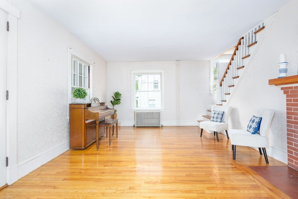 34 Brook Road Sharon, MA 02067 - Photo 6 of 19 a living room with furniture and a table