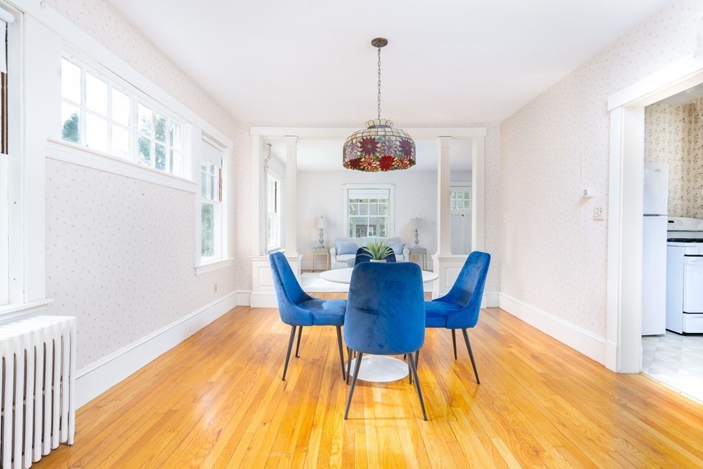 34 Brook Road Sharon, MA 02067 - Photo 8 of 19 a view of a dining room with furniture window and wooden floor