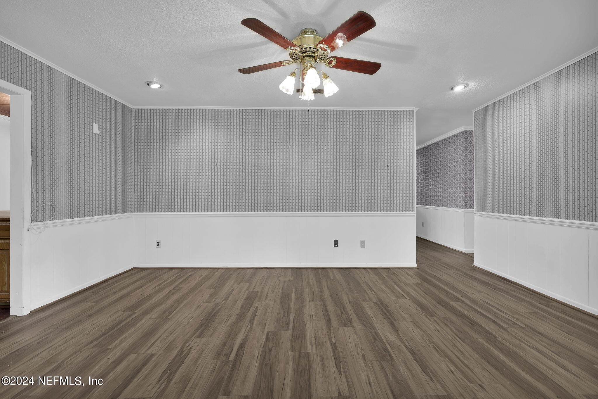 960 Grape Lane St. Johns, FL 32259 - Photo 11 of 46 wooden floor in an empty room with a window