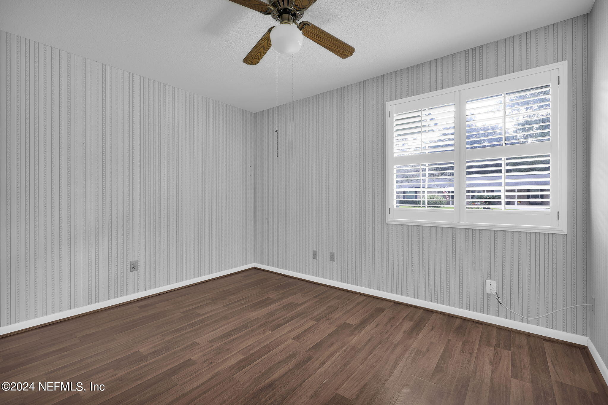 960 Grape Lane St. Johns, FL 32259 - Photo 24 of 46 a view of a room with wooden floor and windows