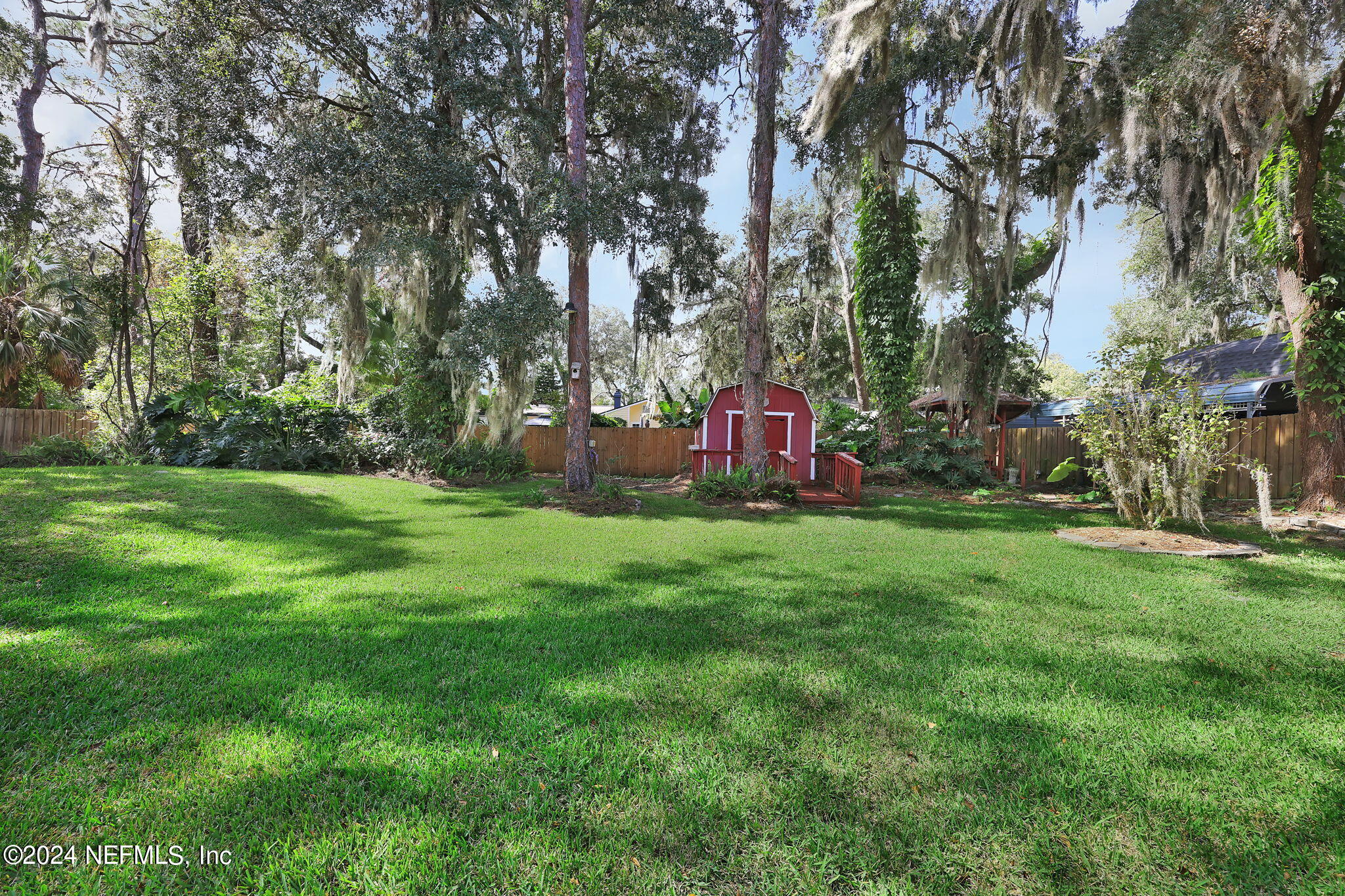 960 Grape Lane St. Johns, FL 32259 - Photo 30 of 46 a view of a backyard with large trees