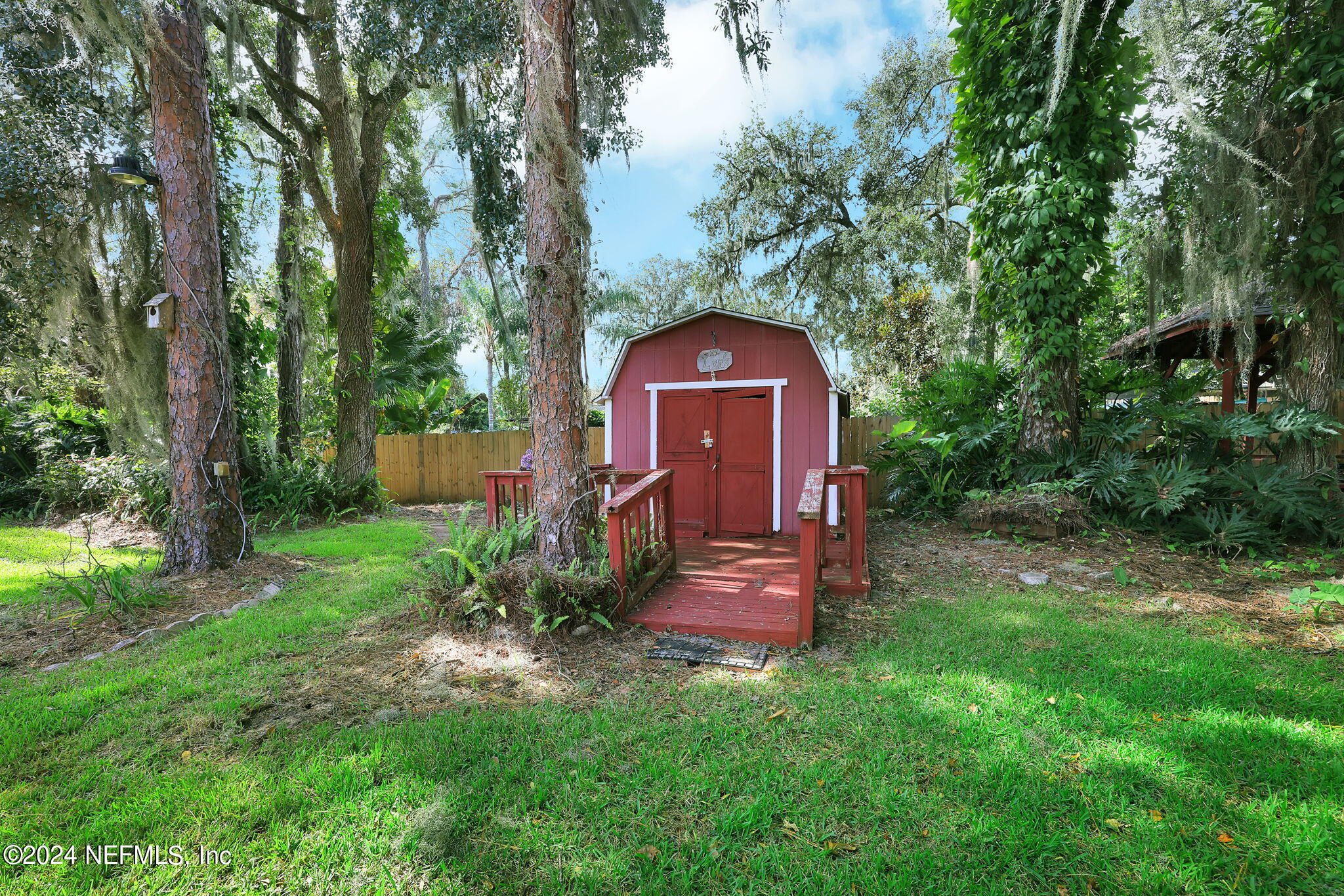 960 Grape Lane St. Johns, FL 32259 - Photo 33 of 46 a view of a wooden house with a yard